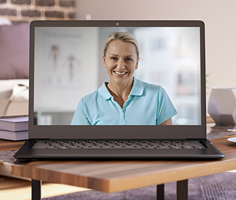 Telerehab doctor on laptop screen